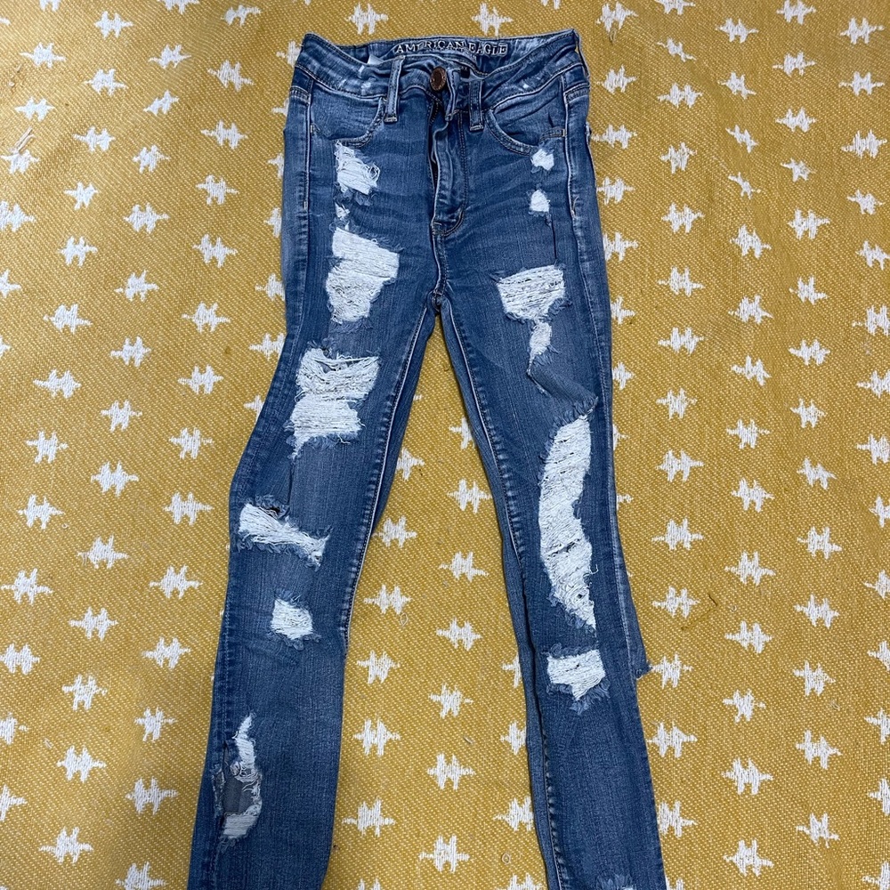 American Eagle Super Distressed high rise stretch jeans